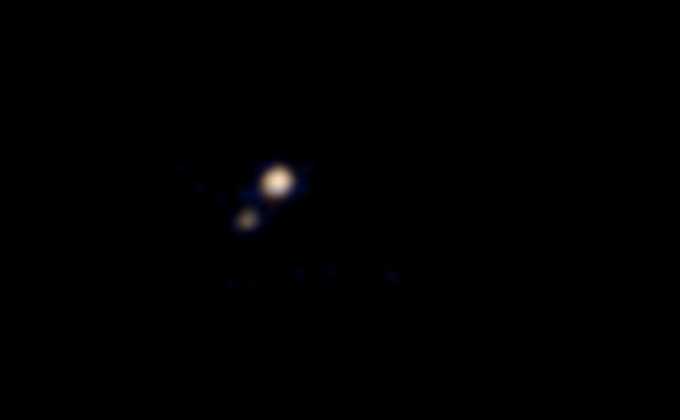 This is the First Ever Color Picture of Pluto, Captured by New Horizons