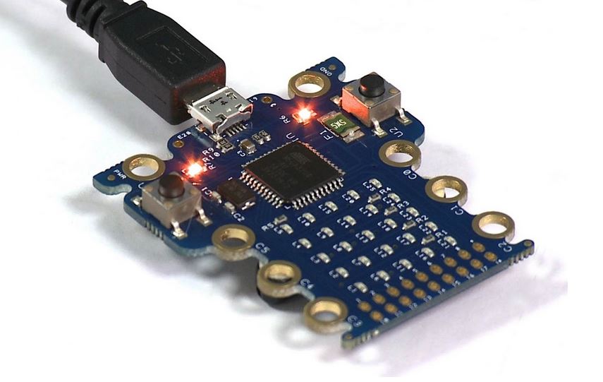 The BBC has finalized the design of Raspberry Pi rival computer Micro:bit that will be given to about one million UK-based children in October. This single-board computing device was first unveiled back in March and now the design is ready for development. This single board Micro:bit computer has been designed with the help of the 29 companies like Microsoft, ARM, Barclays, Samsung, Nordic Semiconductor and Freescale. This device will provide an introduction of computer science to children as a part of the Make It Digital initiative. BBC director-general Tony Hall says that creating Micro:bit computer has been a collaborative adventure for them and this initiative will spread about 1 million Micro:bit computers to the 11- and 12-year olds across the UK (every 6th grade child) This new pocket-sized computer comes with a Bluetooth antenna, USB plug and a processor that is connected to a printed circuit board. This Micro:bit computer comes with a flashing LED display that can light up to show messages and create games. Other features include a built-in compass, an accelerometer and five I/O rings that connect other kits and sensors. Microsoft has developed the web-based coding environment for the device which is a version of its TouchDevelop. PCMag writes that anything written for the Micro:bits computer will be hosted via Microsoft Azure. Also, Redmond has also supplied two coding languages: Microsoft TouchDevelop which is text-based and Microsoft Blocks- a graphical coding language. BBC says that Microsoft TouchDevelop Web app stores all the BBC Micro:bit code editors and runs the Micro:but simulator. The code is finally sent to the ARM compiler and brings the compiled files. Enough about the software, the mbed hardware is supplied by ARM. BBC says that Acron Computers, the makers of ARM technology, partnered with each other 35 years ago to make BBC Micro. The new Micro:bit computer is more powerful and has the potential to inspire the young boys and girls.  The USB controllers and sensors are supplied by Freescale, while Samsung is making an Android app to connect Micro:bit computer to phones and tablets.