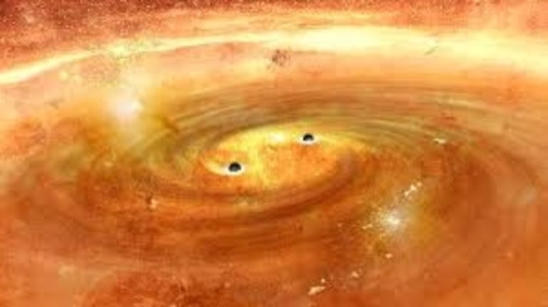 Supermassive Black Holes Found Orbiting Each Other For The First Time