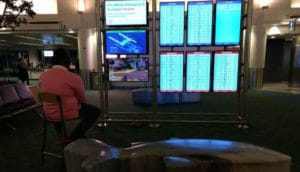 Gamer Hijacks Airport Screen To Play PS4 Game