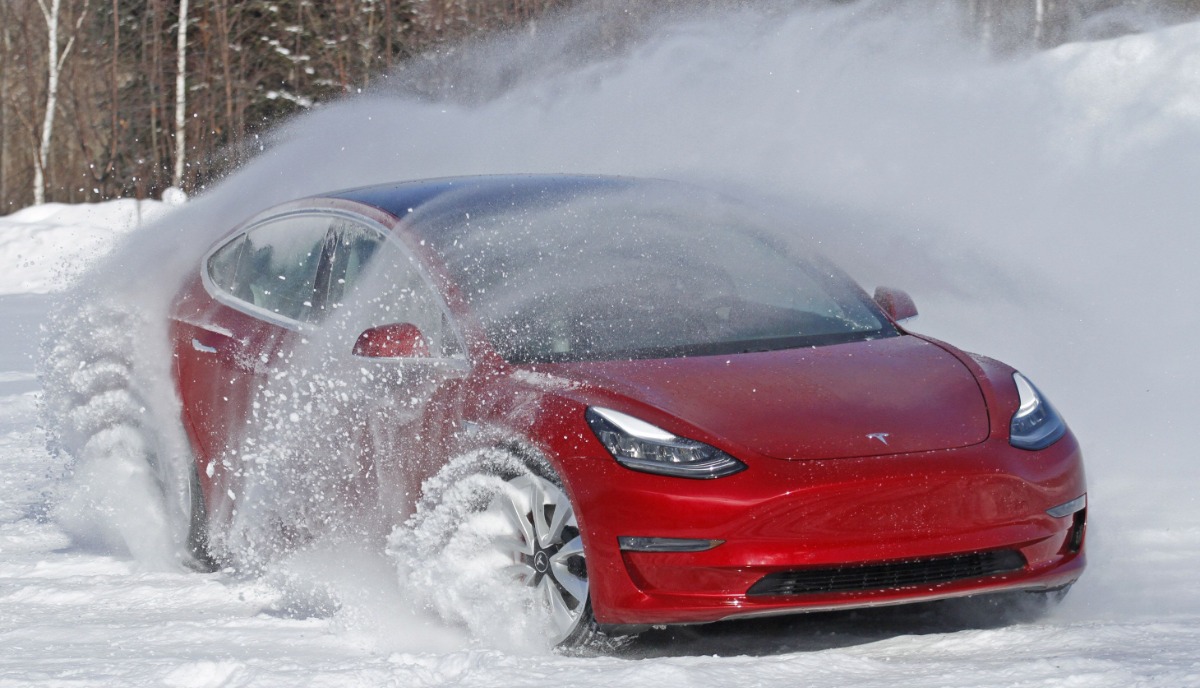 Tesla Model 3 Charges Winter Supercharger