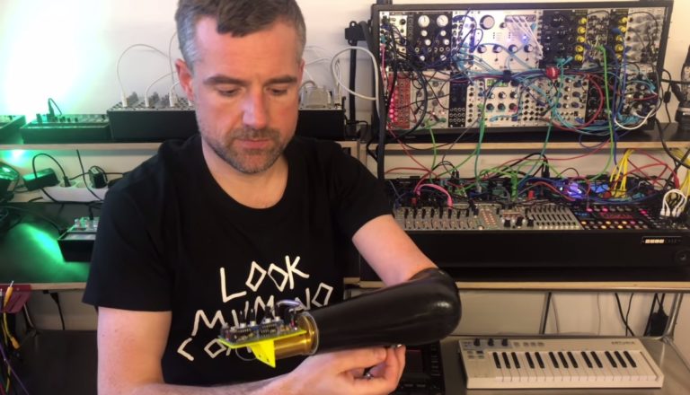 Man hack prosthetic arm mind control music
