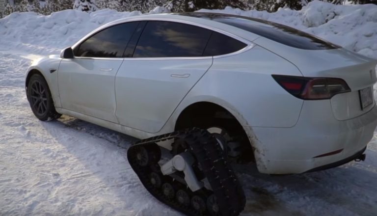 Tesla Model 3 With Snow Tracks