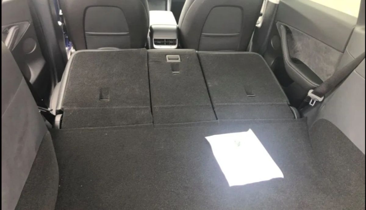 Tesla Model Y interior leak images trunk secret compartment