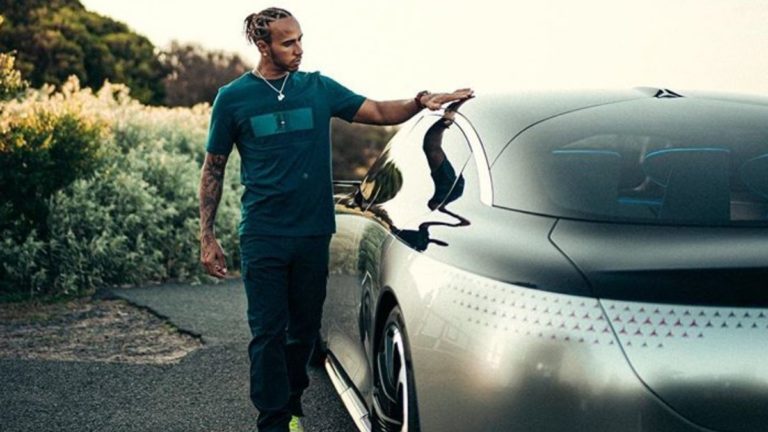Lewis hamilton with his Mercedes EQS