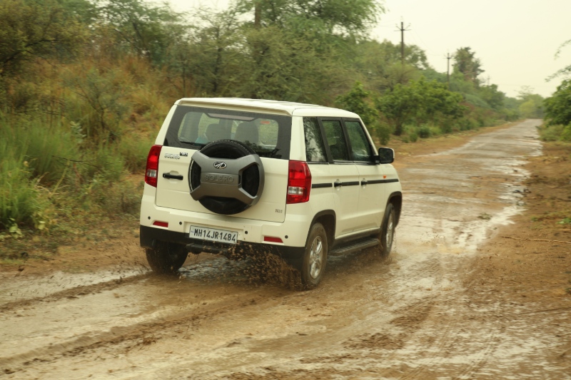 mahindra bolero neo backside view on road