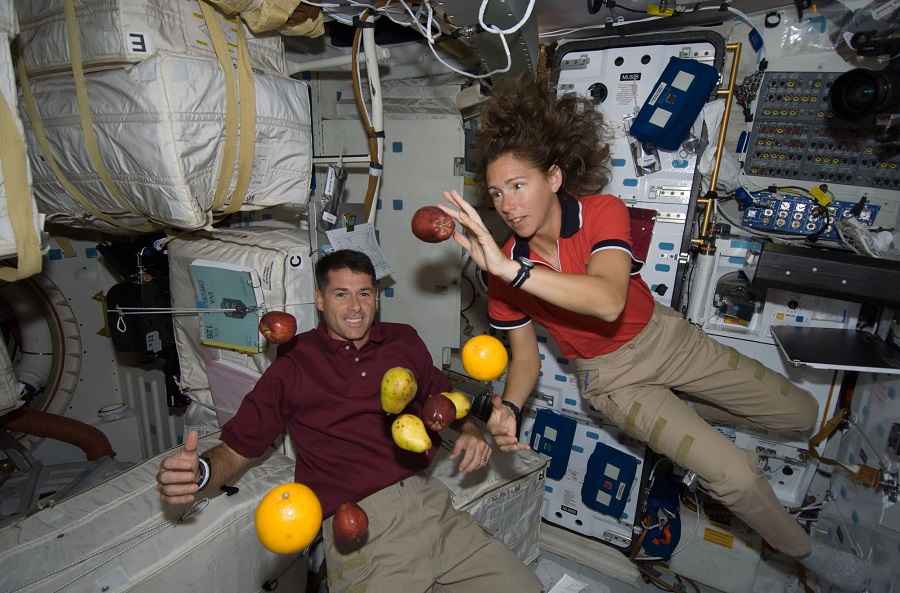 astronauts experiencing weightlessness on the iss