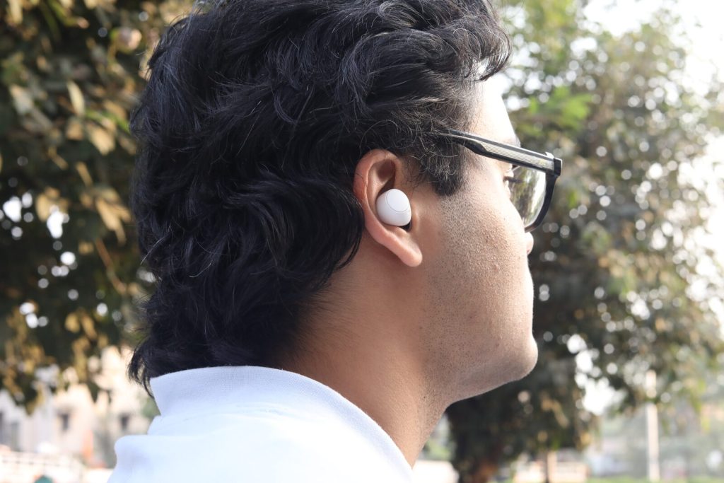 Image of a person wearing the earphones