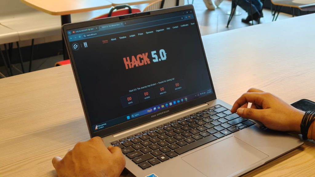 Image of a person using the laptop