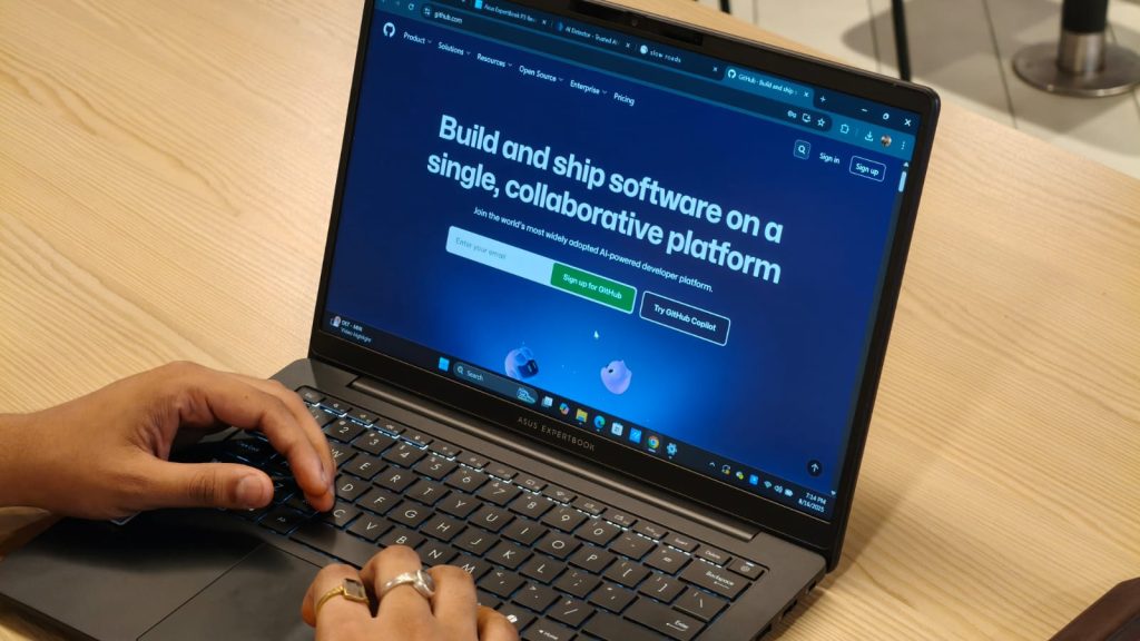 Image of a person using the laptop