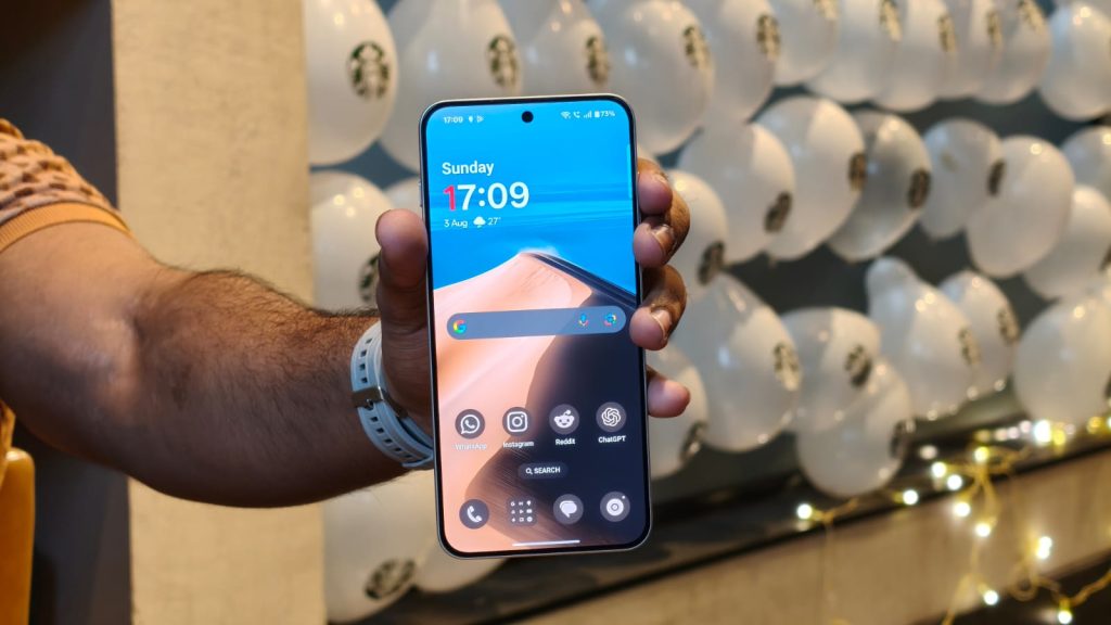 Image of a person holding the OnePlus Nord 5