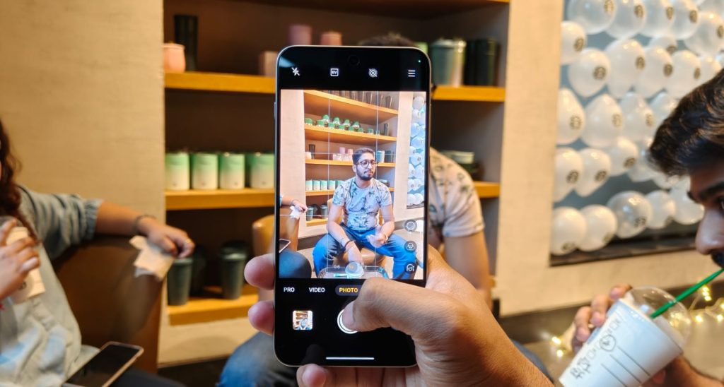 Image of a person taking photos with the OnePlus Nord 5