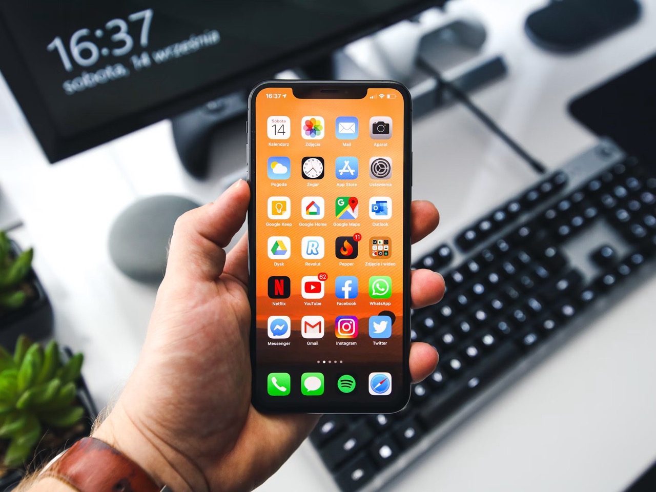 A person holding an iPhone