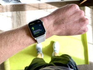 A person wearing Apple Watch to measure body temperature