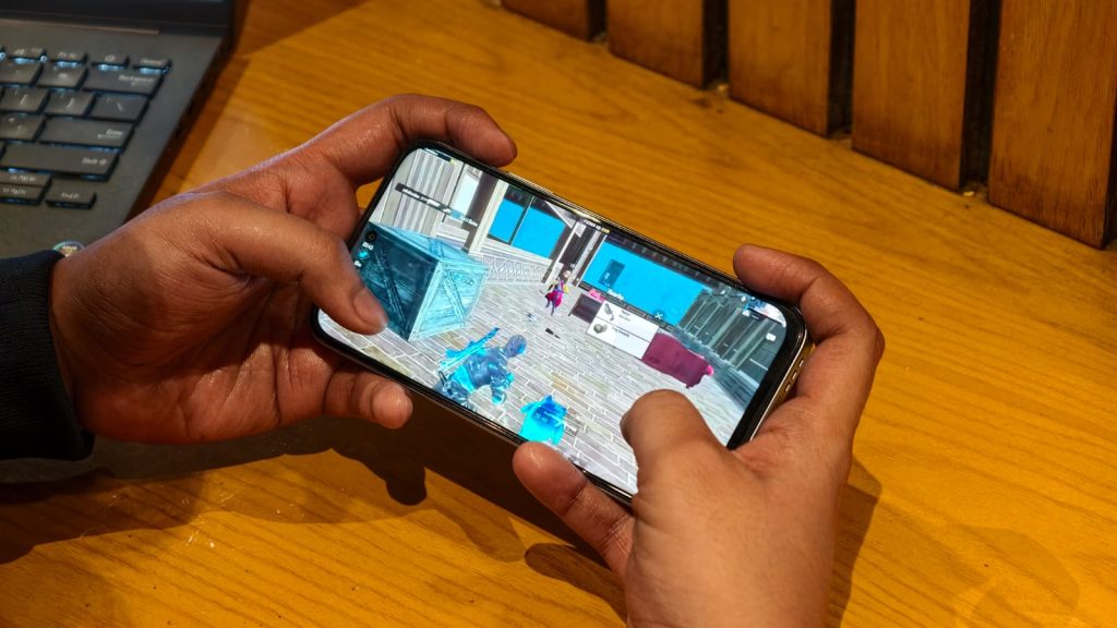 A person playing BGMI on A6x