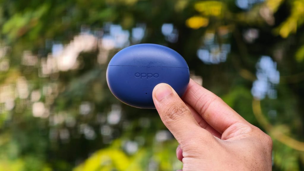 A person holding the OPPO Enco Buds 3 Pro+