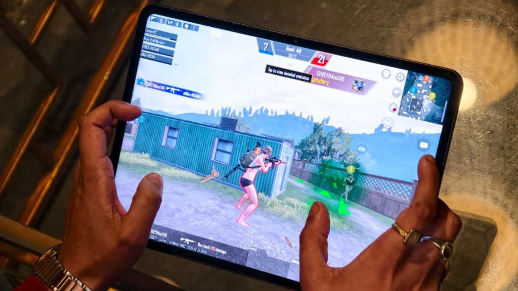 A person gaming on the OnePlus Pad Go 2