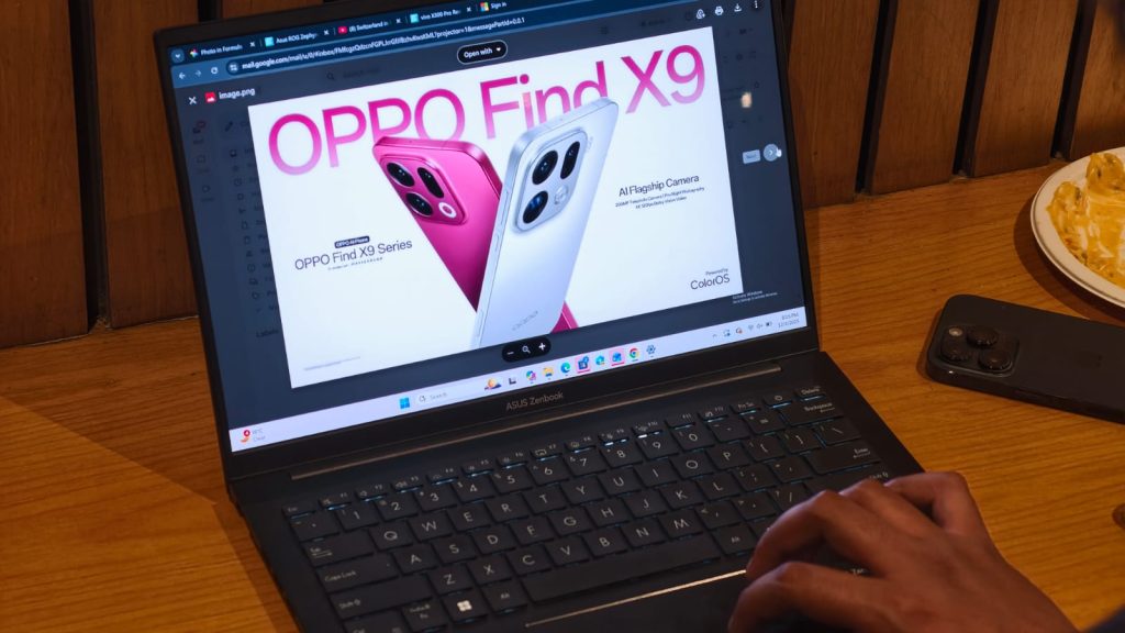 A person working on the Zenbook 14