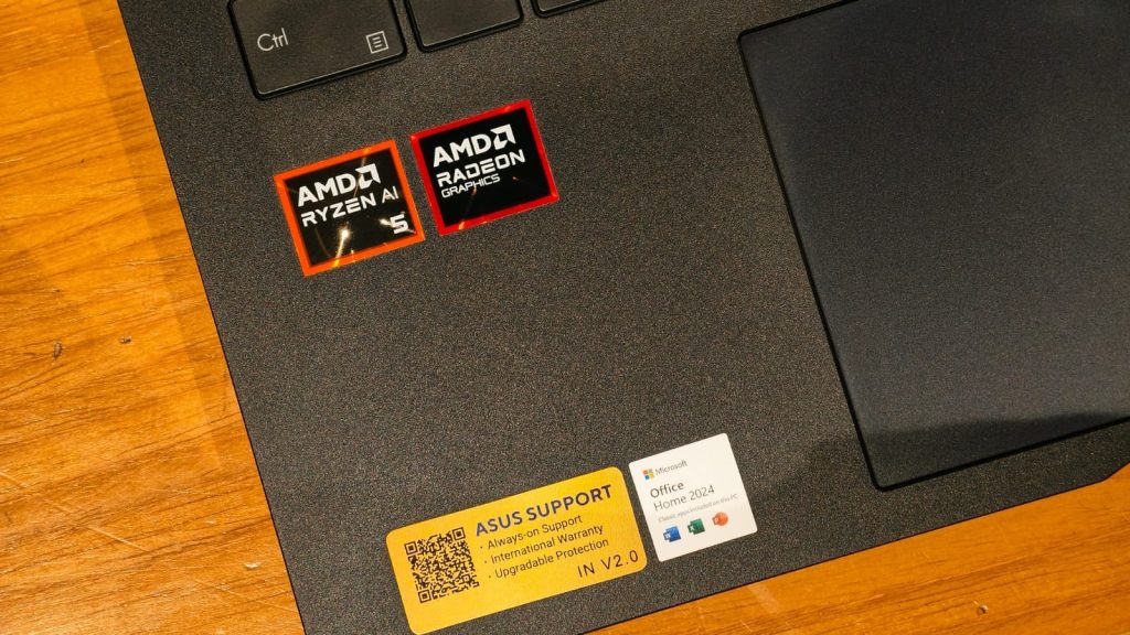 Image of the keyboard deck with a closeup on the AMD branding