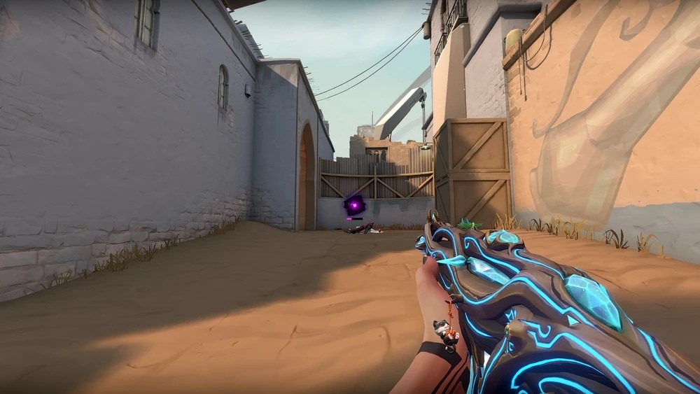 First-person view of Reyna looking at a Soul Orb on the ground, illustrating her aggressive Valorant agents passive