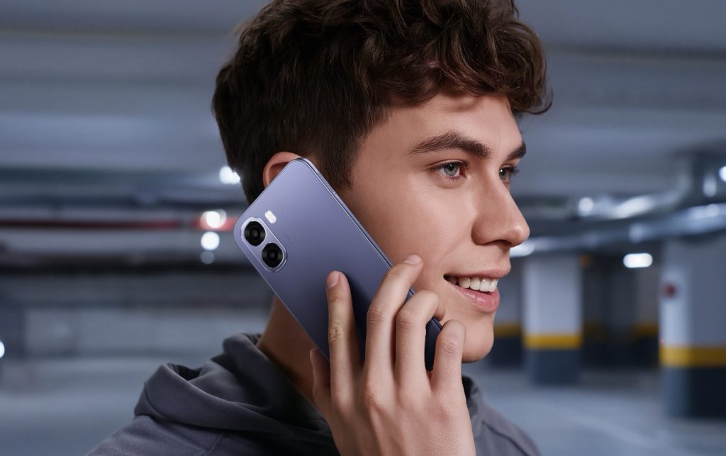 A person taking a call on the OPPO A6s