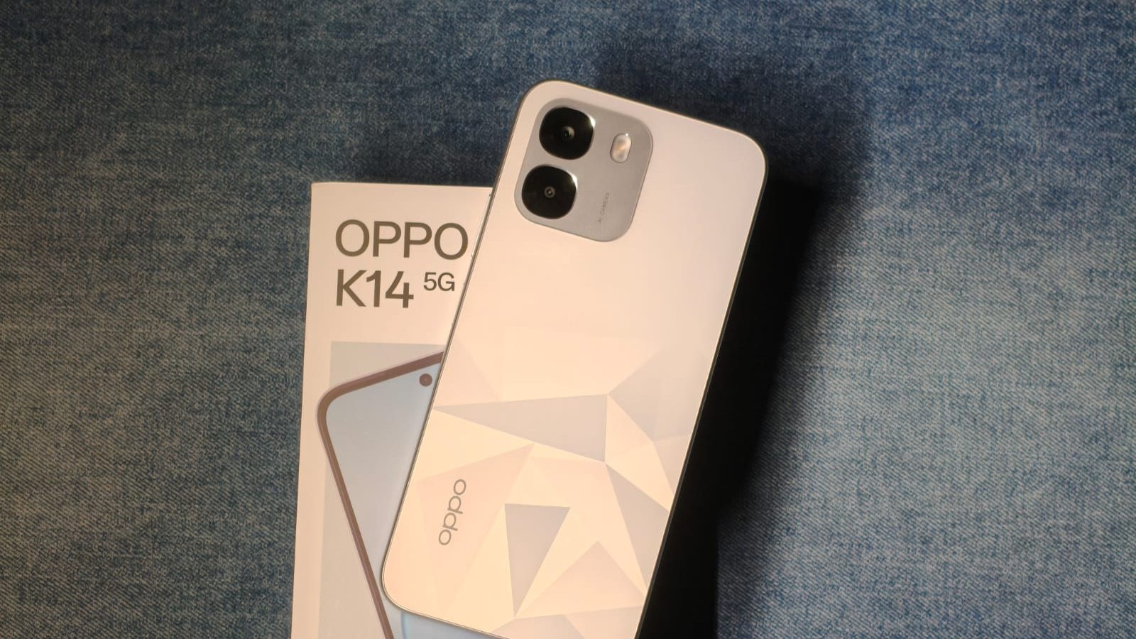 OPPO K14 kept on top of it's box