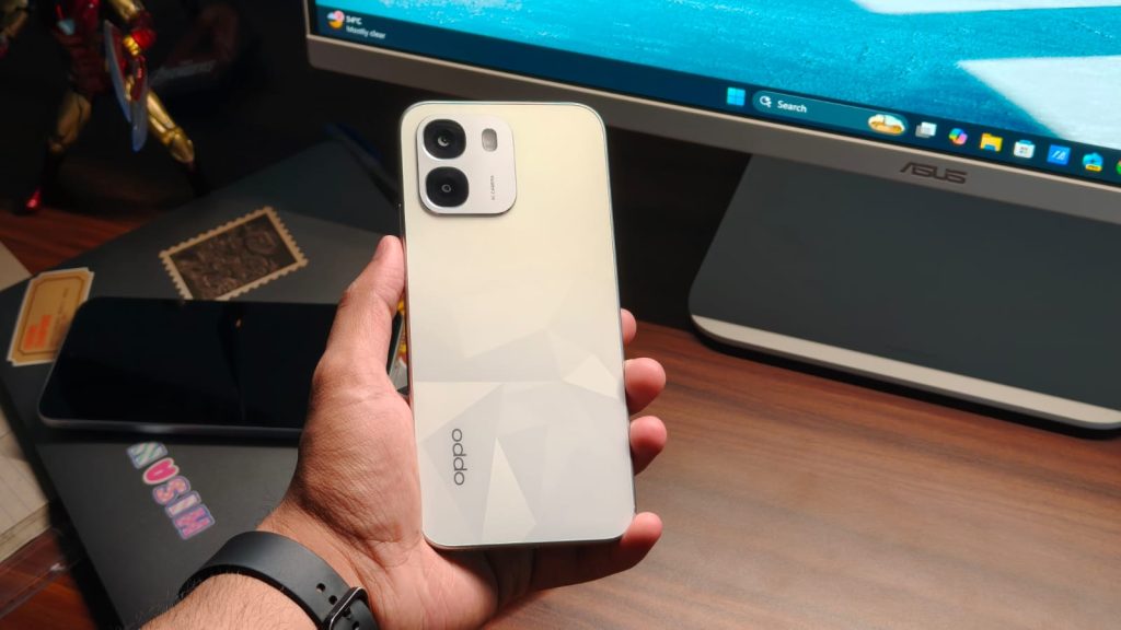 A person holding the OPPO K14