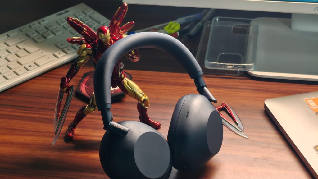 Iron Man holding the XM6 upright