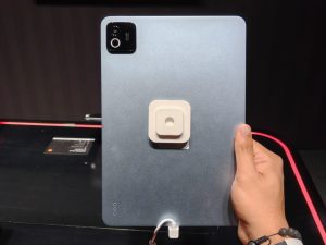 A person holding the Xiaomi pad 8